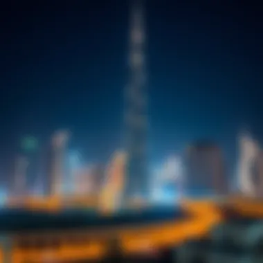 Night view of Al Manara Tower illuminated in the Dubai skyline