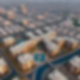 Aerial view of the Almaya Cluster Q in Dubai showcasing its unique architecture